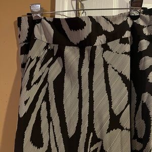 The woman’s long Lined silk like material